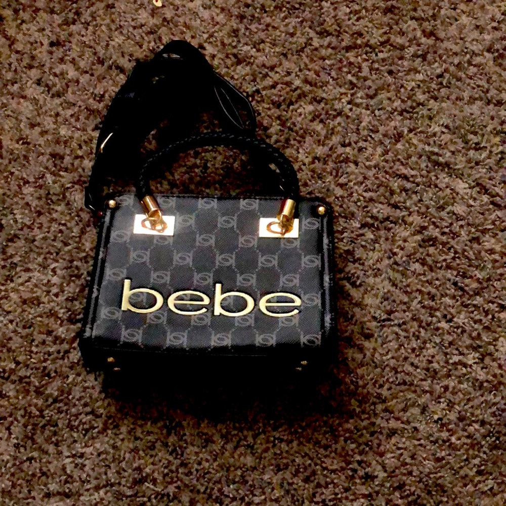 Mini crossbody black with gold endings good condition